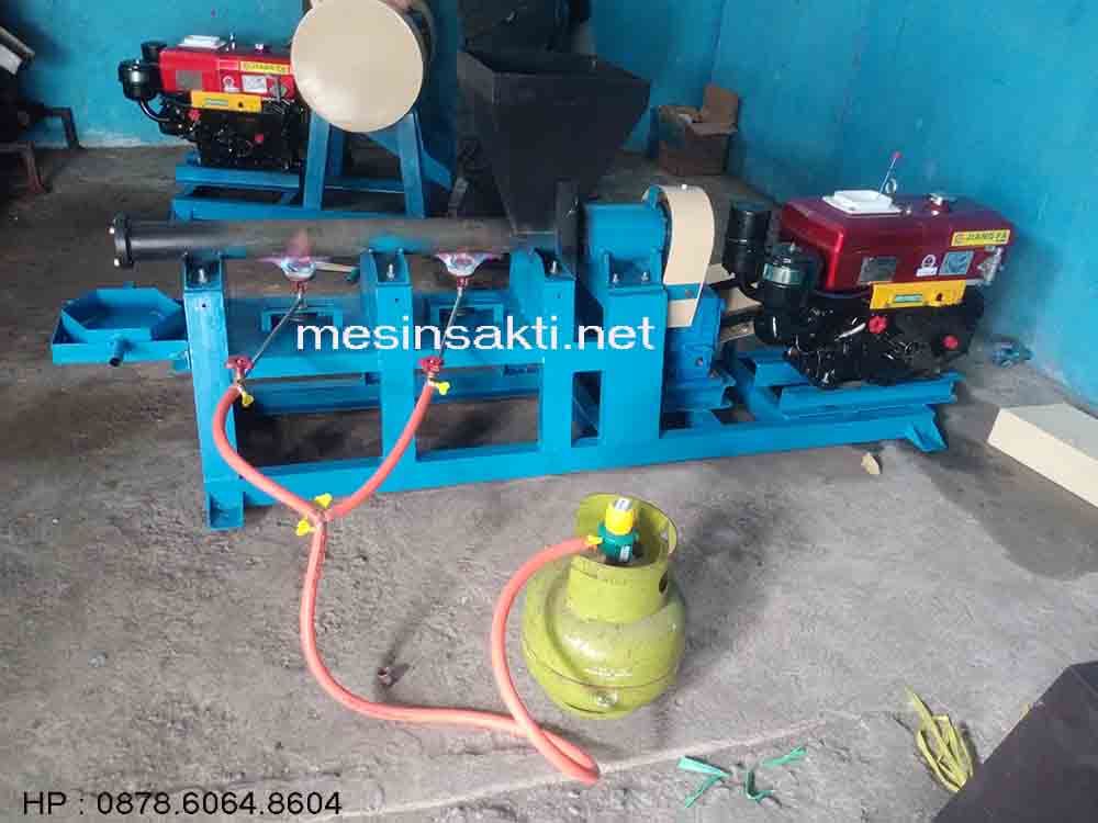 Installasi mesin pelumer plastik