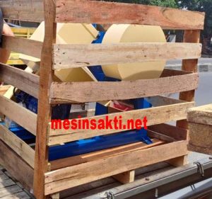 pembungkusan mesin menggunakan kayu 